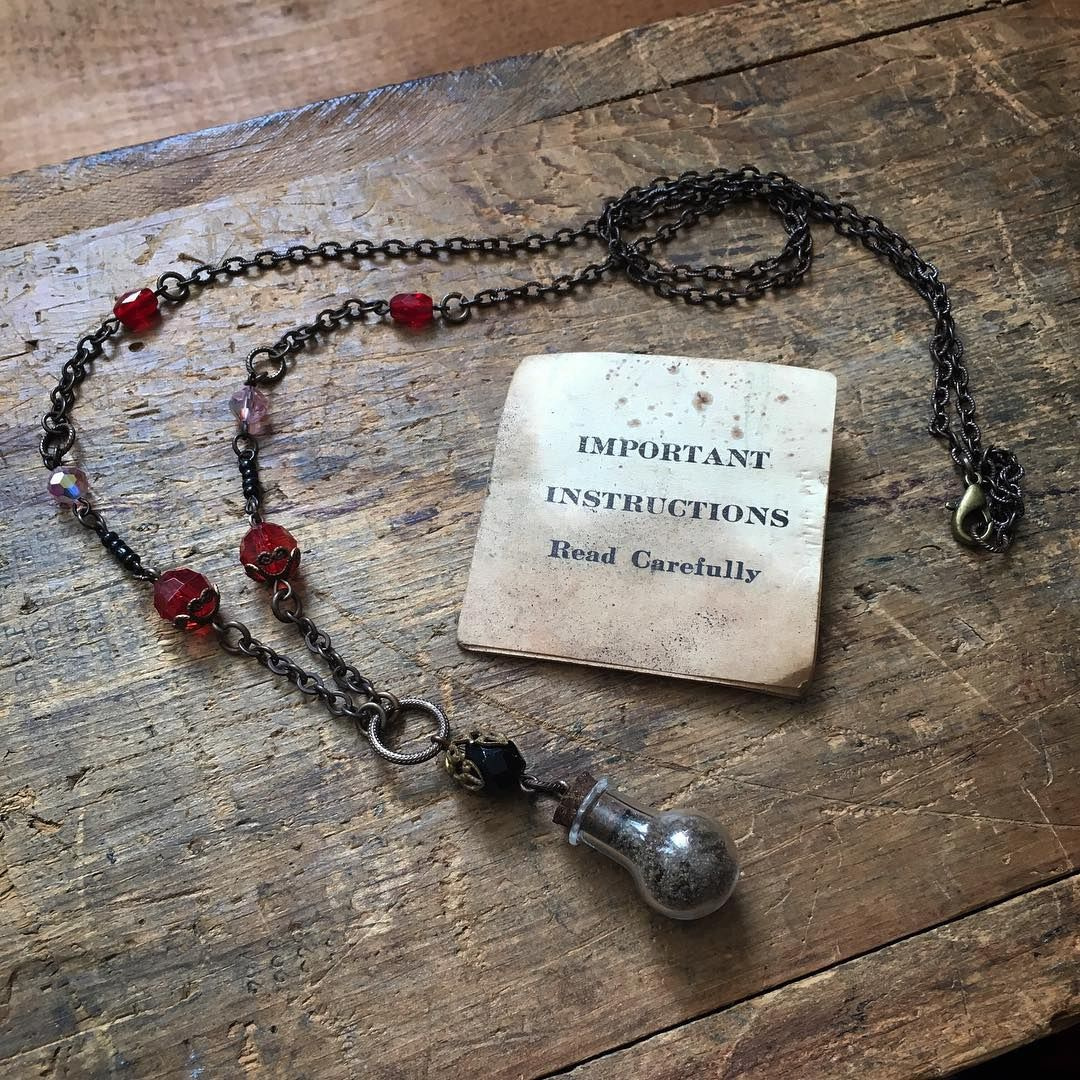 Important Instructions. A Three Posies necklace.